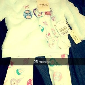 White Baby Outfit with Colorful Patterns